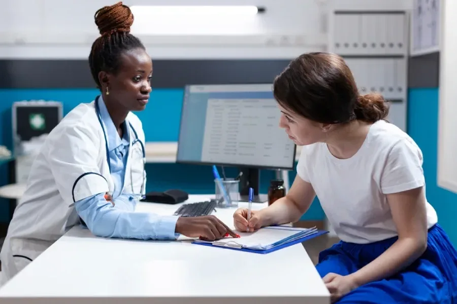 A patient provides medical billing information following emergency care.